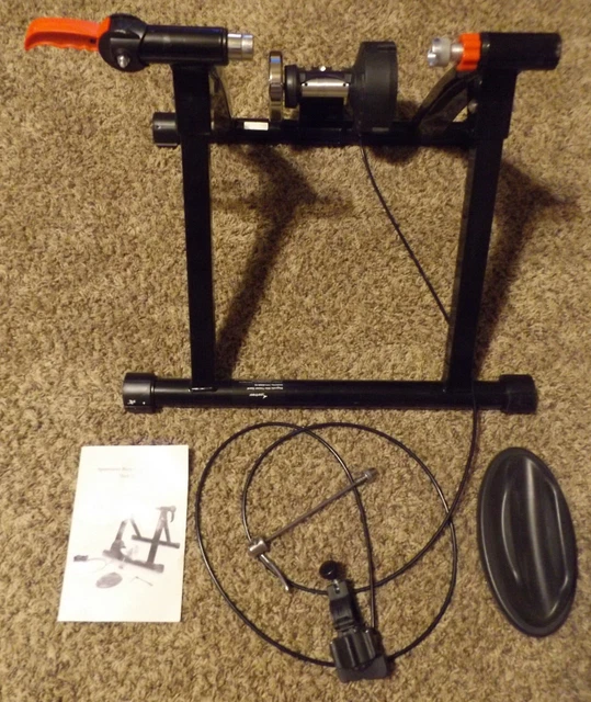 SPORTNEER Y238600001 Steel Bicycle Stand with Noise Reduction Wheel LIGHTLY USED
