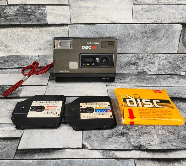 Cámara de disco vintage Halina 118 con repuestos o reparación de discos (usada)