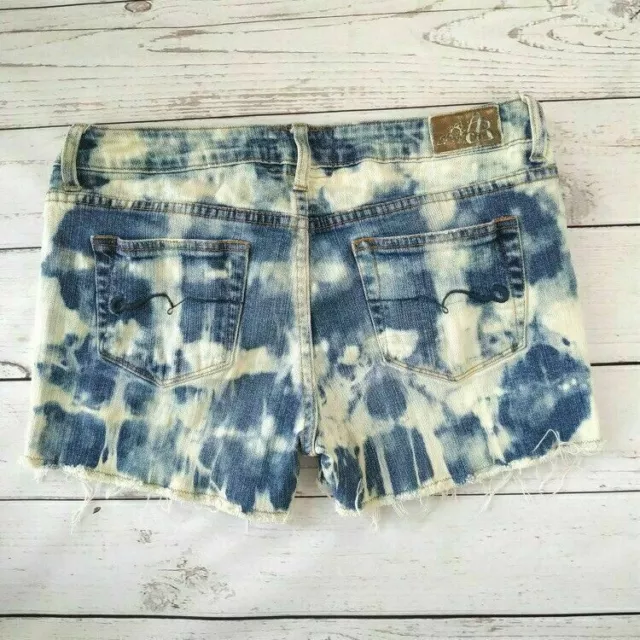 American Rag Upcycled Reverse Tie Dye Size 9 Denim Cutoff Jean shorts w fringe