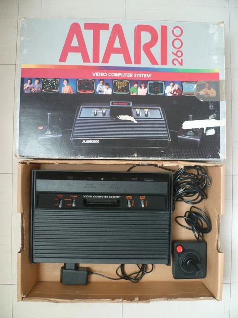 Console Atari 520 STE avec câbles et boite serial matching, bien lire l' annonce