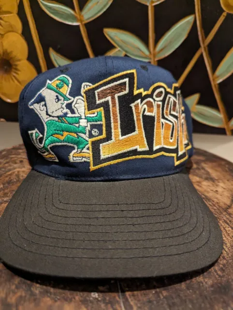 Vintage Notre Dame Graffiti w/Large Leprechaun Top Of The World Snapback Hat