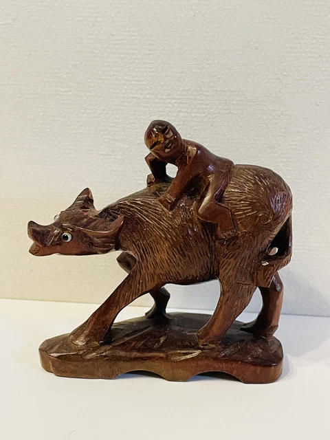 Figurine L’enfant sur un Buffle d'eau en bois Sculpté.