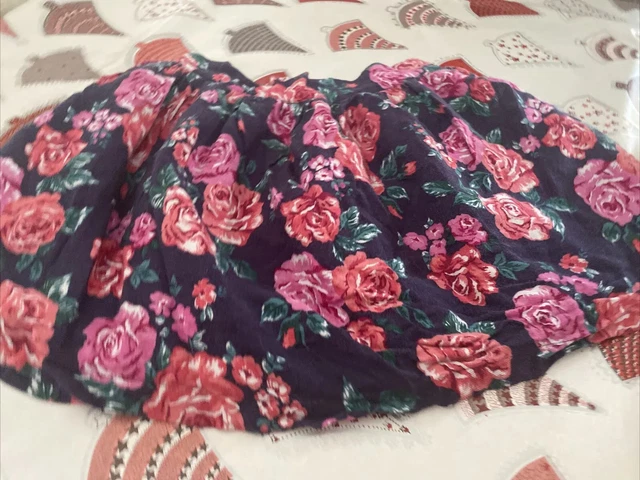 Asda pretty navy and roses girl’s skirt age8/9 years