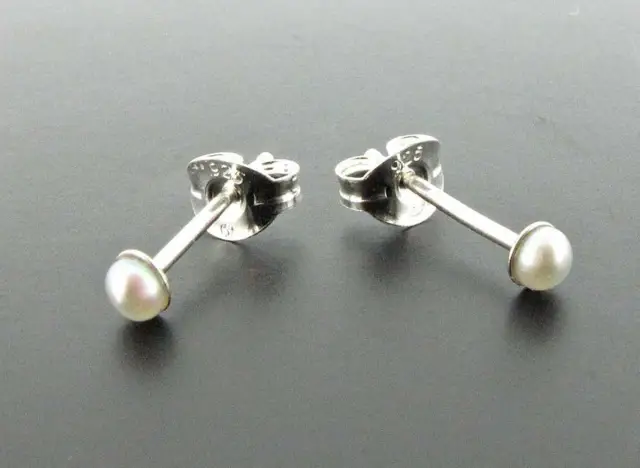 Silver stud earrings with 2 mm white pearls