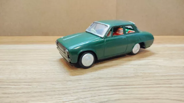 Vintage Retro car Litho Tin Toy  Japan 60s. Isuzu Bellett 2 doors sedan car tin.