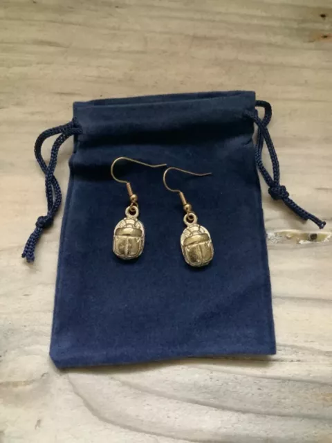 A Pair Of Egyptian Gold Plated Scarab Earrings