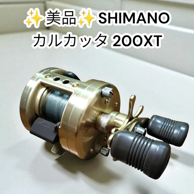 SHIMANO CALCUTTA 200XT ゴールド SHIMANO CALCUTTA 200XT Baitcasting Reel w/ Spare Handle Gold