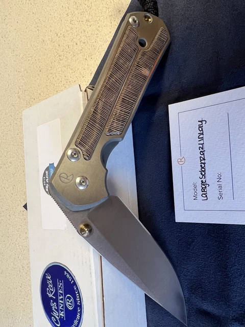 Chris Reeve Large Sebenza 21 Pocket Knife Titanium with Stiped Platan Inlay.