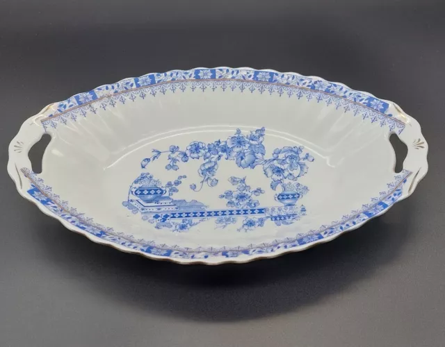Alte ovale Schale/Brotkorb "China blau" aus Porzellan mit Griffmulden .