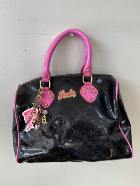 ALDO Barbie™ x ALDO Pink Quilted Charm Turn Lock Crossbody Bag | Dillard's