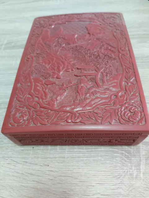 A superb large chinese cinnabar box with landscape decoration