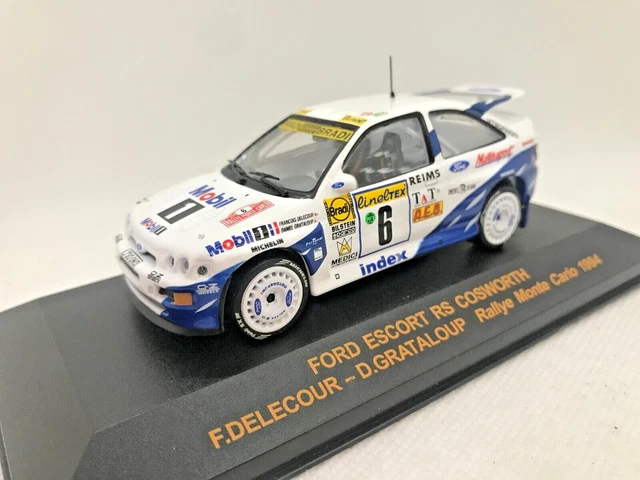 Three-quarters front view of a Red, 1995, Ford Escort RS Cosworth, on