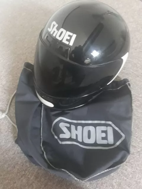 casque moto / scooter intégral de marque Shoei avec sa house 