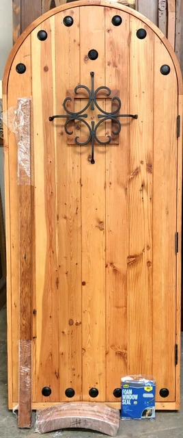 Rustic reclaimed lumber arched door solid wood storybook castle winery