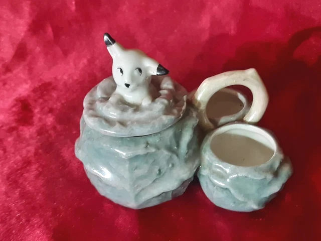 Ancien service à condiment, en porcelaine nacrée