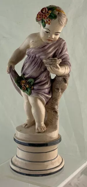Antique German Figurine Mythological Cherub Putty Child God  W/ Bird Nest