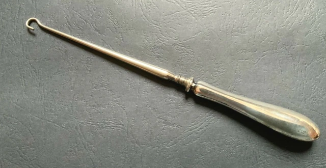 TIRALACCI antico , in Argento ? Oggetto d’epoca da toilette  VINTAGE