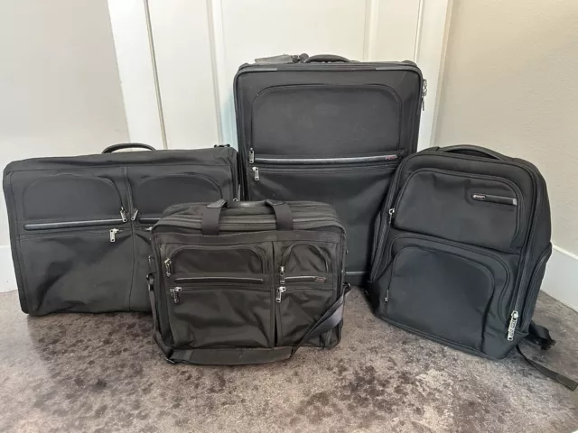 Tumi Alpha 4pcs Set:  Suitcase, Hanging Garment Bag, Briefcase, and Backpack