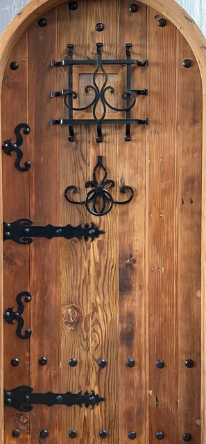 Rustic reclaimed lumber arched door solid wood story book castle winery hardware