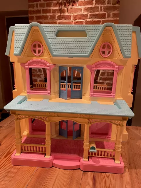 Fisher Price loving family dolls house