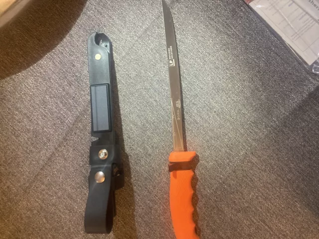 https://www.picclickimg.com/t8cAAOSwsEplZSsb/Cutco-Fishermans-Solution-Knife-With-Sheath-Orange-Handle.webp