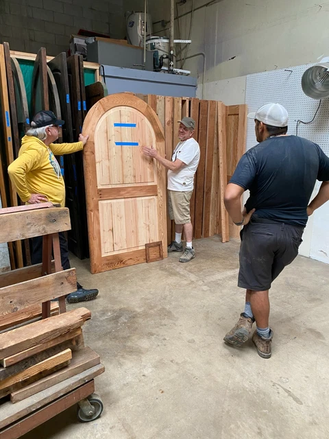 Rustic castle reclaimed lumber arched old growth Doug Fir solid door winery 5