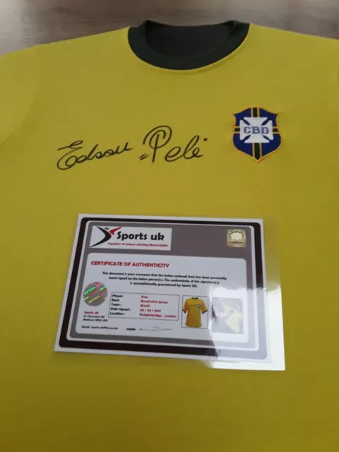 A Signed Brazil Shirt By Pele With Coa