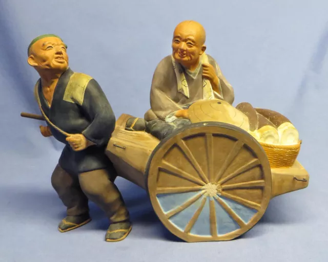 Rare Vintage Japanese HAKATA URASAKI Clay Doll Man with Woman in Cart Figurine