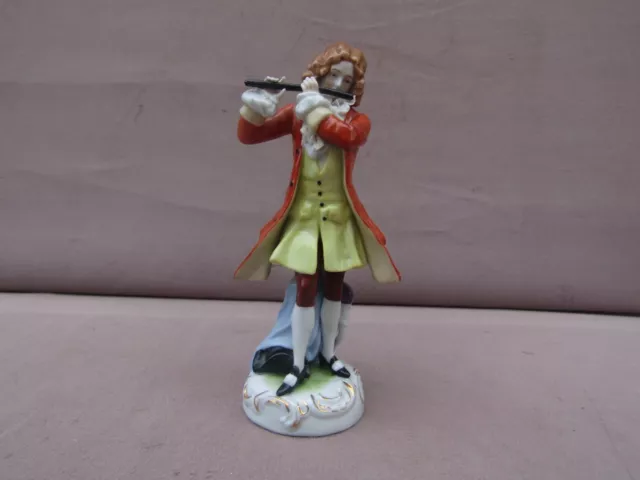 Magnifique petite statuette en porcelaine de Saxe, Allemagne, joueur de flute,