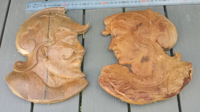 Ancienne paire de mascarons, 2 têtes couple renaissance sculptées sur bois