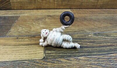 Michelin Tire Man Laying Down Cast Iron Paperweight Ornament Man Cave Garage
