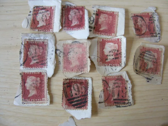 Victorian Penny Red Stamps. x11. They are on their envelope base.