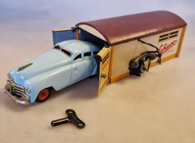Schuco Garage 1500 und Garagen-Auto 1750 Maybach, Blechspielzeug m.Uhrwerk 50er