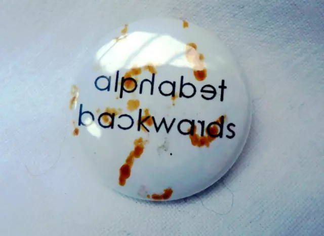 Alphabet Backwards Rare Pin Promo Button Badge Never Worn Unused