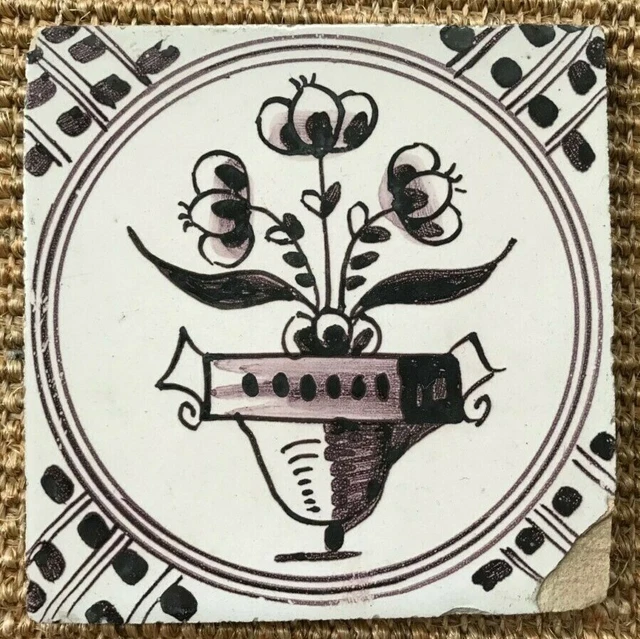Antique 18C Dutch Delft Manganese Tile Featuring A Vase Of Flowers
