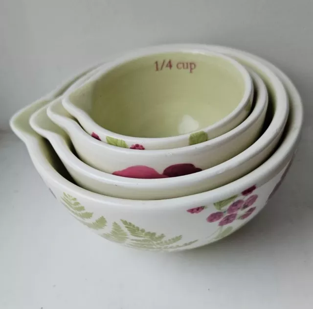 https://www.picclickimg.com/tLcAAOSwyctlPUbf/Set-Of-4-Decorative-Measuring-Cups-Jugs-Pouring.webp