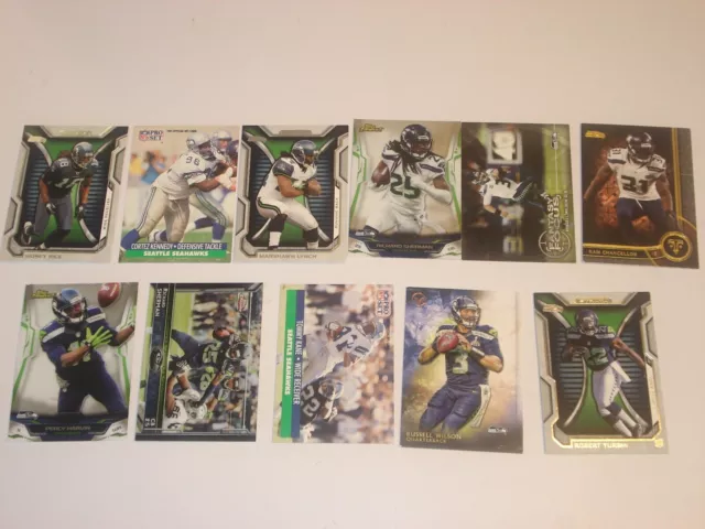 Lot 61 - 11 Seahawks American Football NFL Trading Cards - See Details