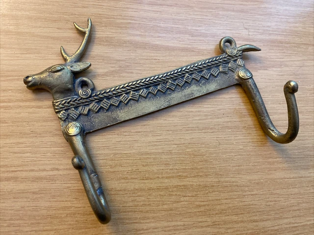 An interesting vintage brass bronze coat hook