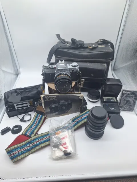 Vintage Canon AE-1 35mm SLR Camera With Extras