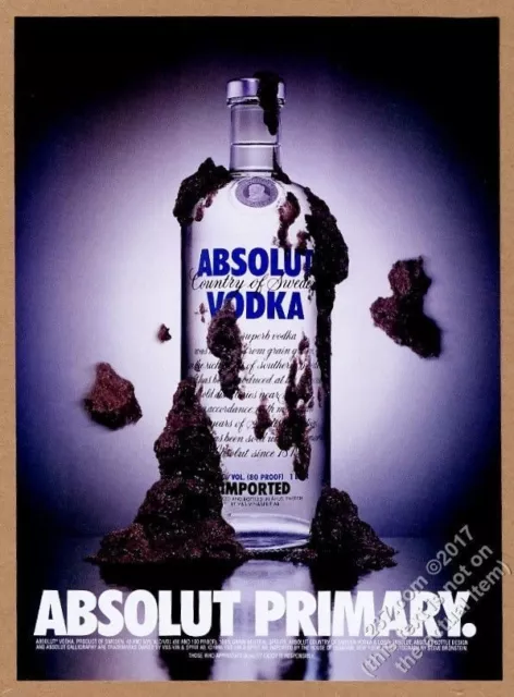 1996 Absolut Primary vodka bottle with mud thrown at it photo vintage print ad