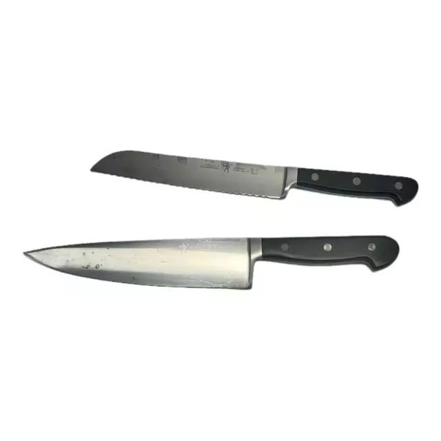 J.A. HENCKELS International Chefs Knife  Two Knives in Lot