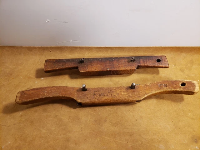 A pair of Antique Wood Wooden Spoke Shave Primitive Woodworking
