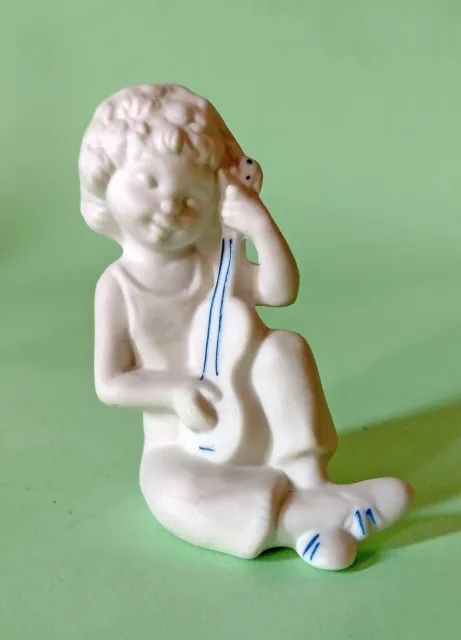 Statuina Porcellana Bianca Opaca Putto Musicante  Ceramica Capodimonte