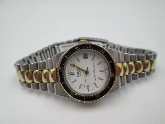 Reloj pulsar dorado clearance