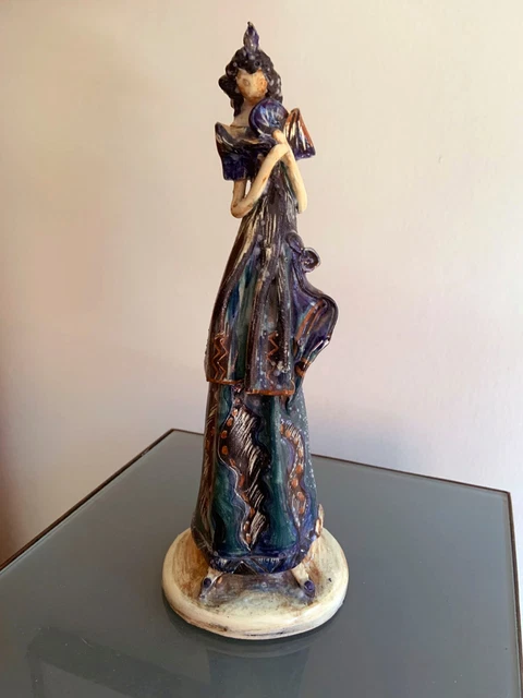 Signed pottery figure hand painted / enamelled
