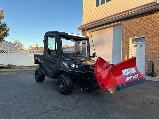 KUBOTA RTV850, LE, HEATED CAB, RADIO, 4x4, BRAND NEW WESTERN V PLOW , 67 HOURS