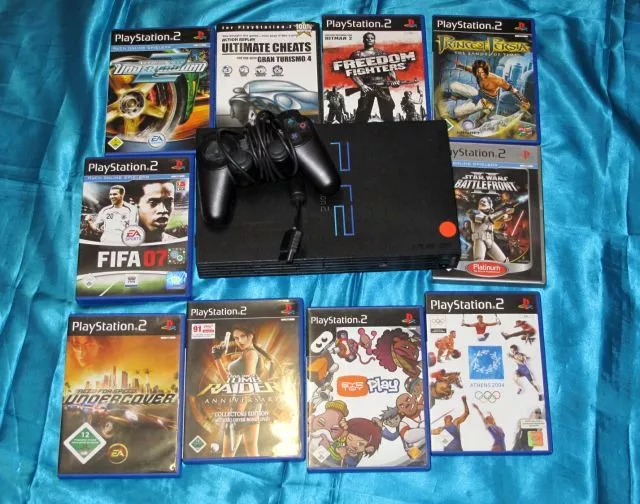 Sony PlayStation 2 Schwarz Spielekonsole + 4 Spiele