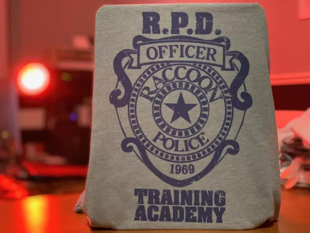 T-Shirt Resident Evil Racoon Stadt Polizeiministerium Akademie - RPD