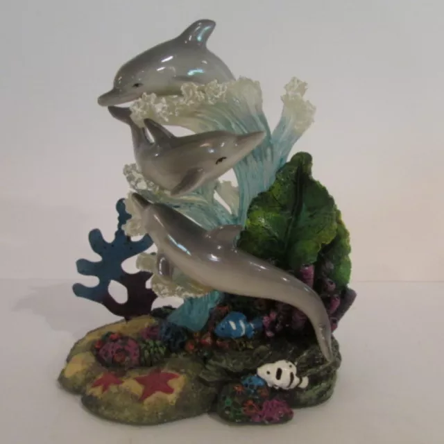 Three Dolphins Swimming in Colorful Ocean Floor Figurine 7.5" x 6"