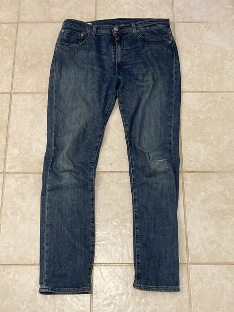 Vintage Levi Made in Poland 511 32x32 Jeans with White rivets blank red tag